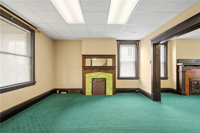 408 Lydia St, Carnegie, PA 15106 - unfurnished living room featuring a fireplace, carpet floors, and a drop ceiling