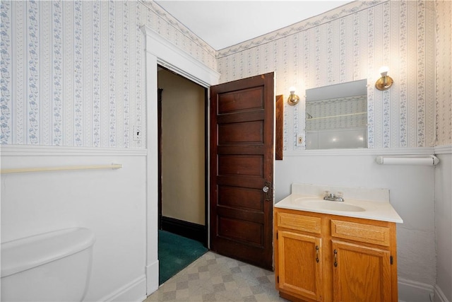 408 Lydia St, Carnegie, PA 15106 - bathroom featuring vanity, wallpapered walls, and wainscoting