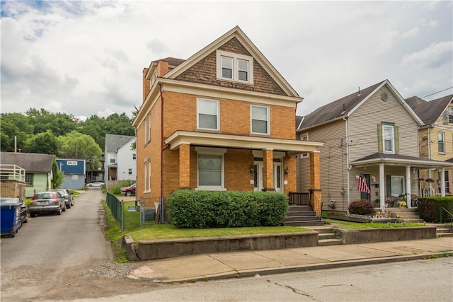 408 Lydia St, Carnegie, PA 15106 - traditional style home with brick siding and a porch
