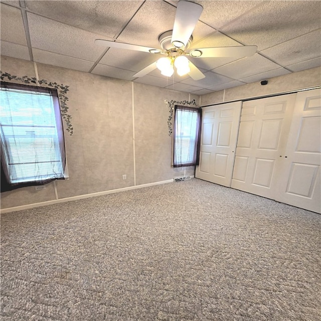 76 Foch Cir, Nemacolin, PA 15351 - unfurnished bedroom with carpet flooring, a paneled ceiling, a closet, and a ceiling fan
