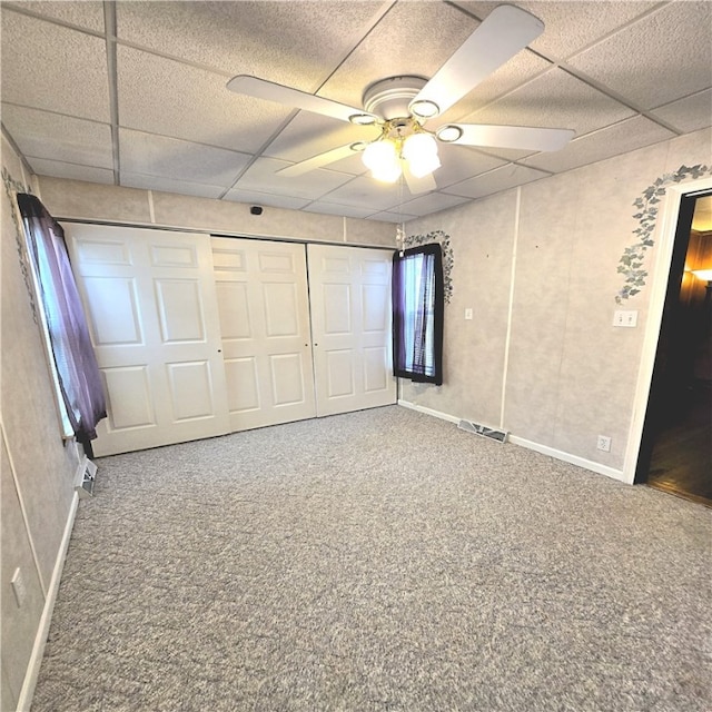 76 Foch Cir, Nemacolin, PA 15351 - unfurnished bedroom featuring carpet, a paneled ceiling, a ceiling fan, and a closet