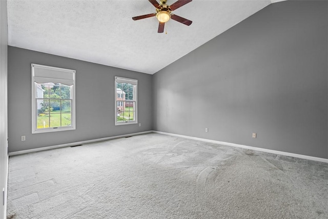 1445 Bristol Dr, South Park, PA 15129 - carpeted empty room with vaulted ceiling, ceiling fan, and a textured ceiling