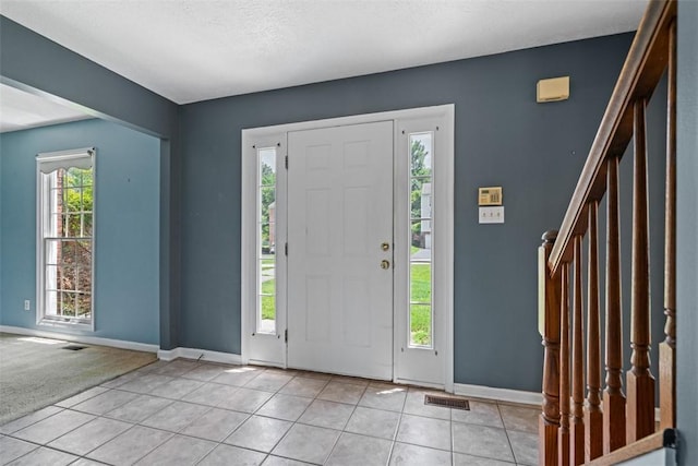 1445 Bristol Dr, South Park, PA 15129 - foyer featuring light tile patterned floors and stairway
