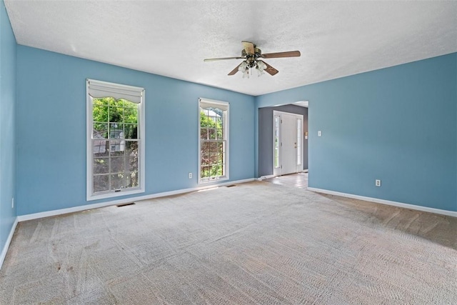 1445 Bristol Dr, South Park, PA 15129 - spare room featuring a ceiling fan, a textured ceiling, and carpet flooring