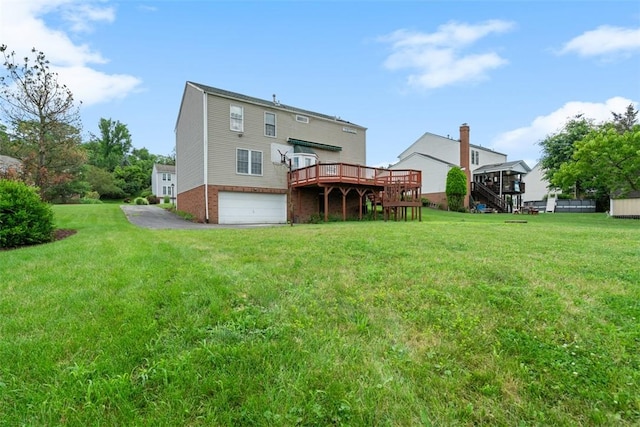 1445 Bristol Dr, South Park, PA 15129 - back of house featuring stairs, a wooden deck, an attached garage, a yard, and brick siding