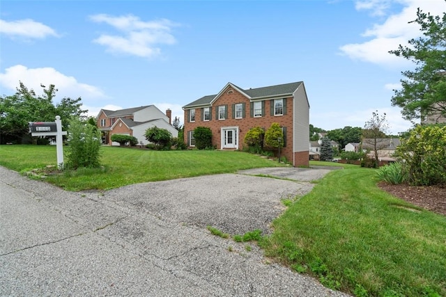 1445 Bristol Dr, South Park, PA 15129 - colonial home with brick siding and a front yard