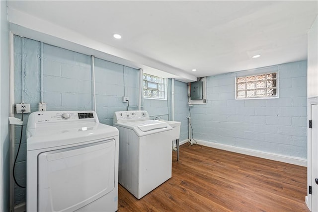 451 Charlotte Dr, Baldwin Boro, PA 15236 - laundry room with electric panel, healthy amount of natural light, wood finished floors, and washer and dryer