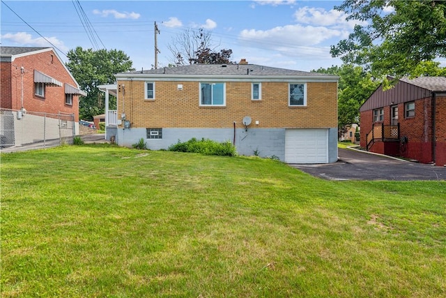 451 Charlotte Dr, Baldwin Boro, PA 15236 - rear view of property featuring driveway, brick siding, and an attached garage