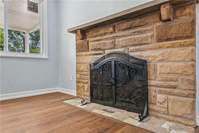 451 Charlotte Dr, Baldwin Boro, PA 15236 - detailed view of a stone fireplace and wood finished floors