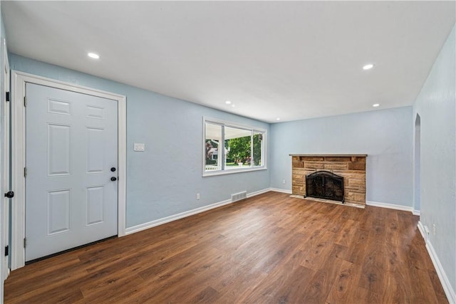 451 Charlotte Dr, Baldwin Boro, PA 15236 - unfurnished living room with dark wood finished floors, a fireplace, and recessed lighting