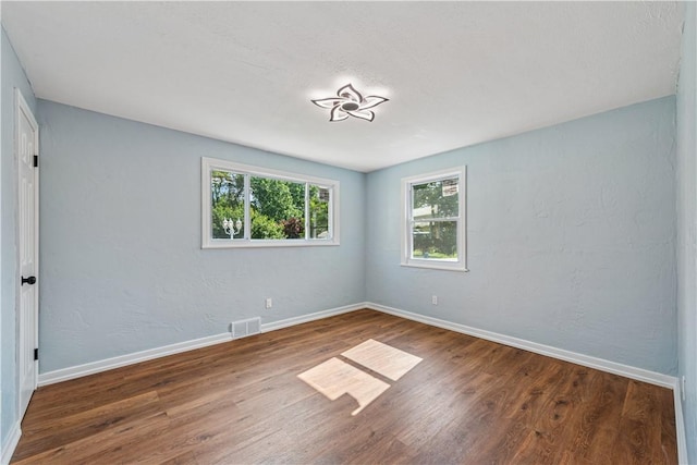 451 Charlotte Dr, Baldwin Boro, PA 15236 - empty room featuring wood finished floors and baseboards