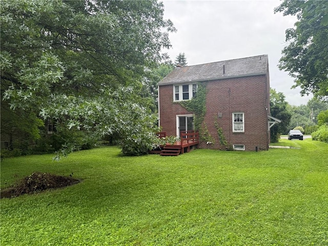 103 Belmont Rd, Twp Of But Ne, PA 16001 - back of house featuring brick siding, a lawn, and a deck