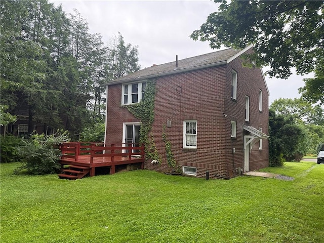 103 Belmont Rd, Twp Of But Ne, PA 16001 - rear view of house with brick siding and a lawn