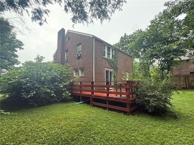 103 Belmont Rd, Twp Of But Ne, PA 16001 - rear view of house with a deck, a chimney, brick siding, and cooling unit