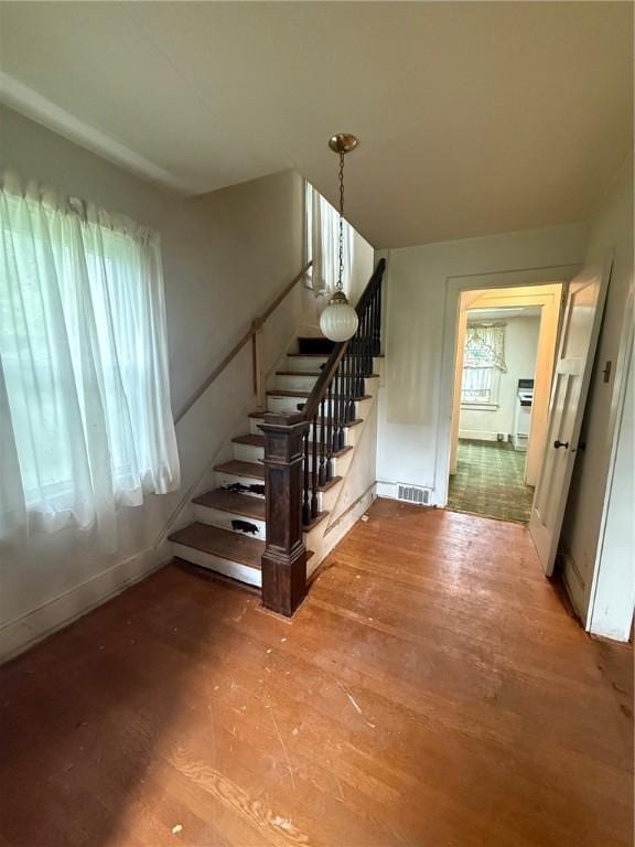 103 Belmont Rd, Twp Of But Ne, PA 16001 - stairs featuring wood finished floors and baseboards