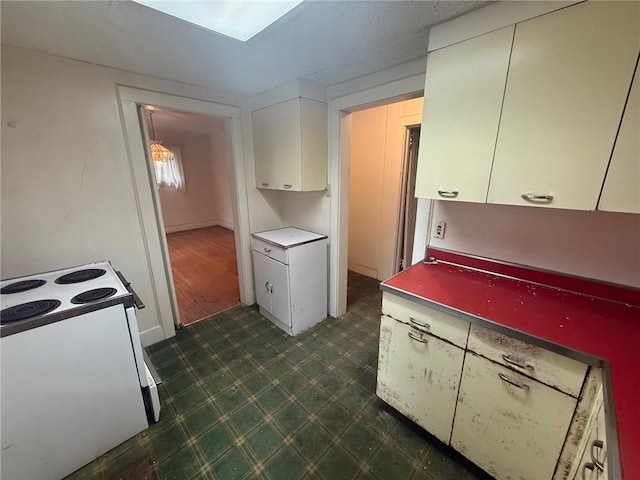 103 Belmont Rd, Twp Of But Ne, PA 16001 - kitchen with white electric range oven and white cabinetry
