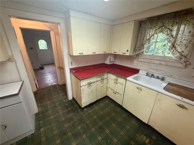 103 Belmont Rd, Twp Of But Ne, PA 16001 - kitchen with dark floors and light countertops