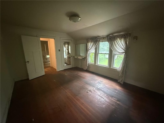 103 Belmont Rd, Twp Of But Ne, PA 16001 - unfurnished bedroom with dark wood finished floors and lofted ceiling