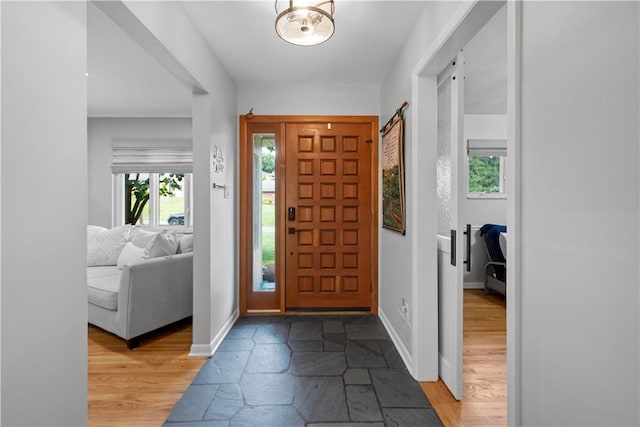 2633 Cedarvue Dr, Saint Clair, PA 15241 - entryway with stone tile flooring and baseboards