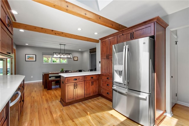 2633 Cedarvue Dr, Saint Clair, PA 15241 - kitchen featuring stainless steel appliances, a peninsula, beamed ceiling, light wood-style flooring, and light countertops