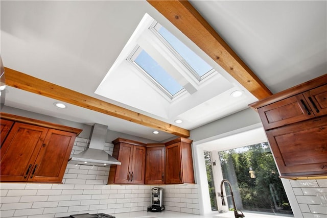 2633 Cedarvue Dr, Saint Clair, PA 15241 - kitchen with wall chimney range hood, a skylight, tasteful backsplash, recessed lighting, and beamed ceiling