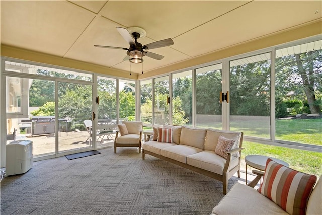 2633 Cedarvue Dr, Saint Clair, PA 15241 - sunroom with an outdoor living space, a ceiling fan, and view of scattered trees