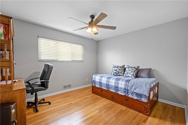 2633 Cedarvue Dr, Saint Clair, PA 15241 - bedroom featuring light wood-style flooring, an office area, and ceiling fan