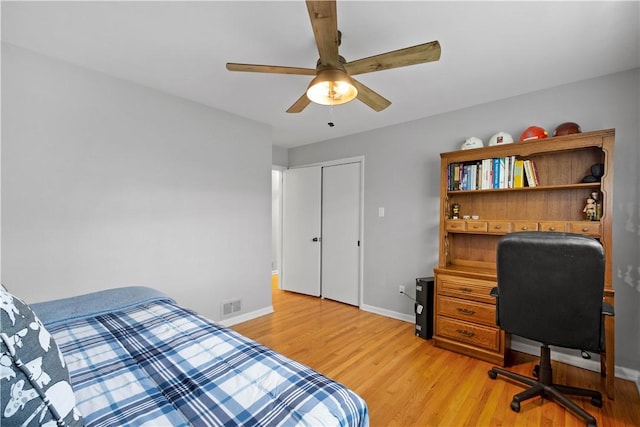 2633 Cedarvue Dr, Saint Clair, PA 15241 - bedroom with light wood finished floors, a ceiling fan, a closet, and a desk