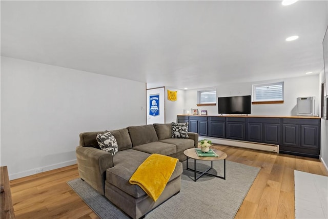 2633 Cedarvue Dr, Saint Clair, PA 15241 - living area with light wood finished floors, a baseboard radiator, and recessed lighting