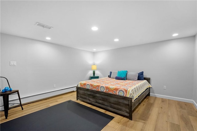 2633 Cedarvue Dr, Saint Clair, PA 15241 - bedroom with a baseboard radiator, wood finished floors, and recessed lighting