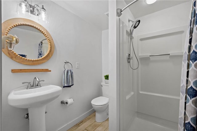 2633 Cedarvue Dr, Saint Clair, PA 15241 - bathroom with a shower with curtain and wood finished floors