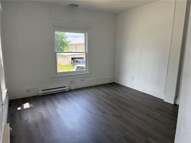 240 2nd Ave, Sharon, PA 16146 - spare room featuring a baseboard heating unit, dark wood-style flooring, and baseboard heating