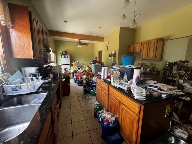 237 Dawson Ave, Glenfield, PA 15143 - kitchen with tile patterned flooring, ceiling fan, brown cabinets, and a kitchen island