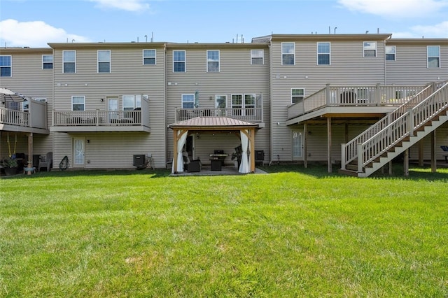 1004 Pointe View Dr, Adams Twp, PA 16046 - rear view of property with a gazebo, a yard, a wooden deck, and stairs