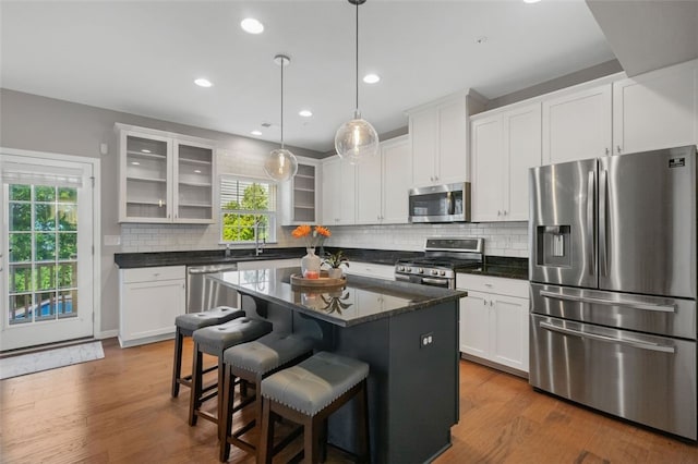 1004 Pointe View Dr, Adams Twp, PA 16046 - kitchen featuring stainless steel appliances, plenty of natural light, glass insert cabinets, white cabinetry, and recessed lighting