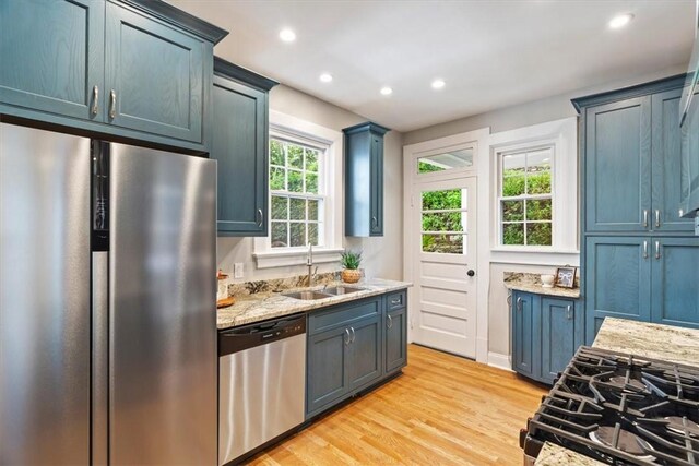 248 Berringer Pl, Ben Avon, PA 15202 - kitchen with stainless steel appliances, light wood-style floors, light stone countertops, recessed lighting, and blue cabinets