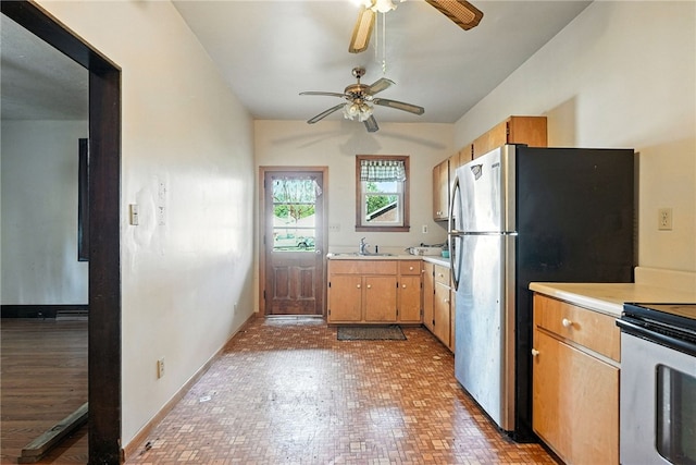 419 8th Ave, Patterson Heights, PA 15010 - kitchen with a ceiling fan, electric range oven, light countertops, and freestanding refrigerator