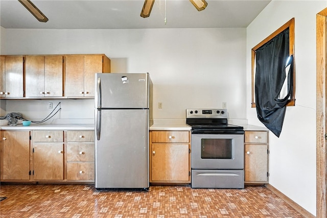 419 8th Ave, Patterson Heights, PA 15010 - kitchen with appliances with stainless steel finishes, light countertops, and a ceiling fan