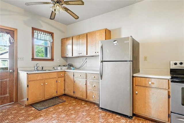 419 8th Ave, Patterson Heights, PA 15010 - kitchen with stainless steel appliances, light countertops, ceiling fan, and light floors