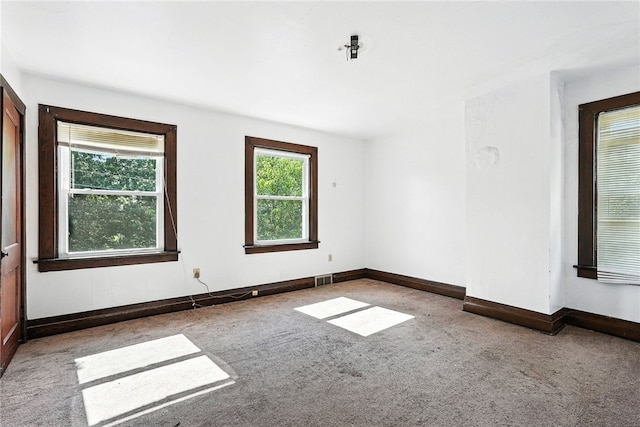 419 8th Ave, Patterson Heights, PA 15010 - carpeted empty room featuring baseboards