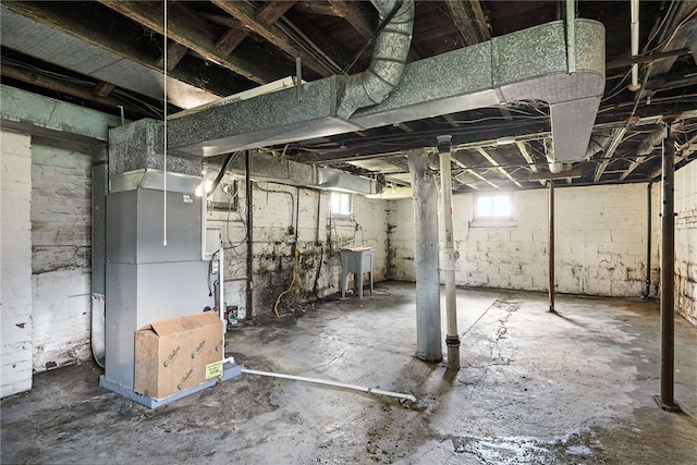 419 8th Ave, Patterson Heights, PA 15010 - basement with heating unit and a sink