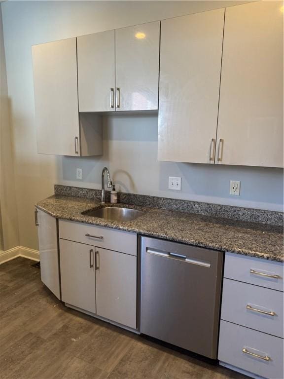 2411 Sarah St, South Side, PA 15203 - kitchen featuring dishwasher, dark wood finished floors, dark stone counters, and white cabinets