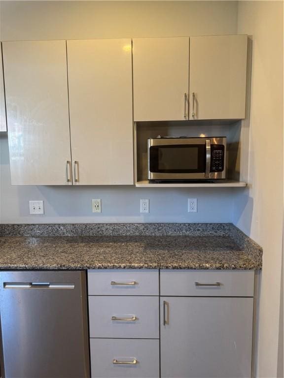 2411 Sarah St, South Side, PA 15203 - kitchen featuring appliances with stainless steel finishes and dark stone counters
