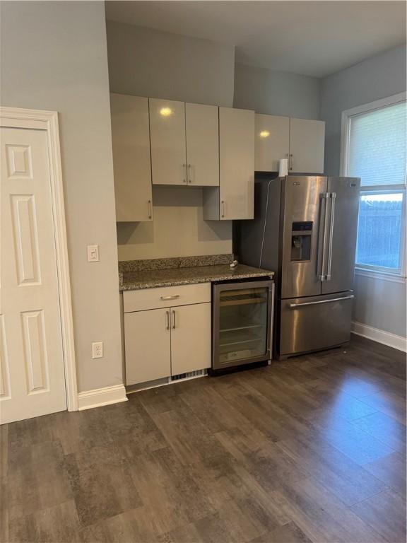 2411 Sarah St, South Side, PA 15203 - kitchen featuring beverage cooler, stainless steel fridge, and dark wood-style flooring