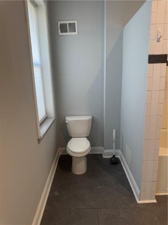 2411 Sarah St, South Side, PA 15203 - full bathroom with healthy amount of natural light, tile patterned floors, a shower, and a bath