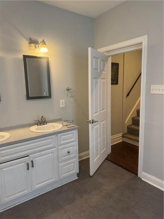 2411 Sarah St, South Side, PA 15203 - bathroom with double vanity and tile patterned flooring