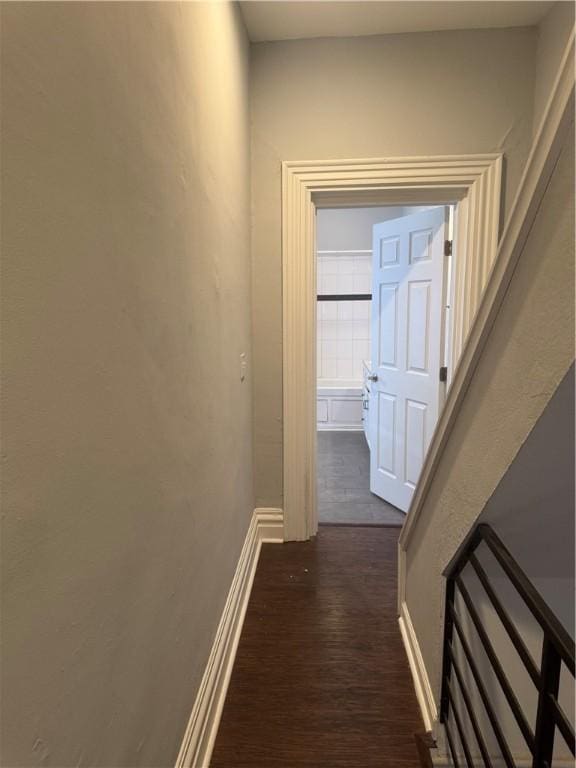 2411 Sarah St, South Side, PA 15203 - hallway with dark wood finished floors and baseboards