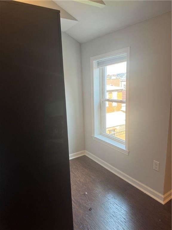 2411 Sarah St, South Side, PA 15203 - empty room with dark wood-style floors and vaulted ceiling