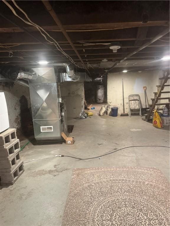 2411 Sarah St, South Side, PA 15203 - unfinished basement featuring stairs and heating unit
