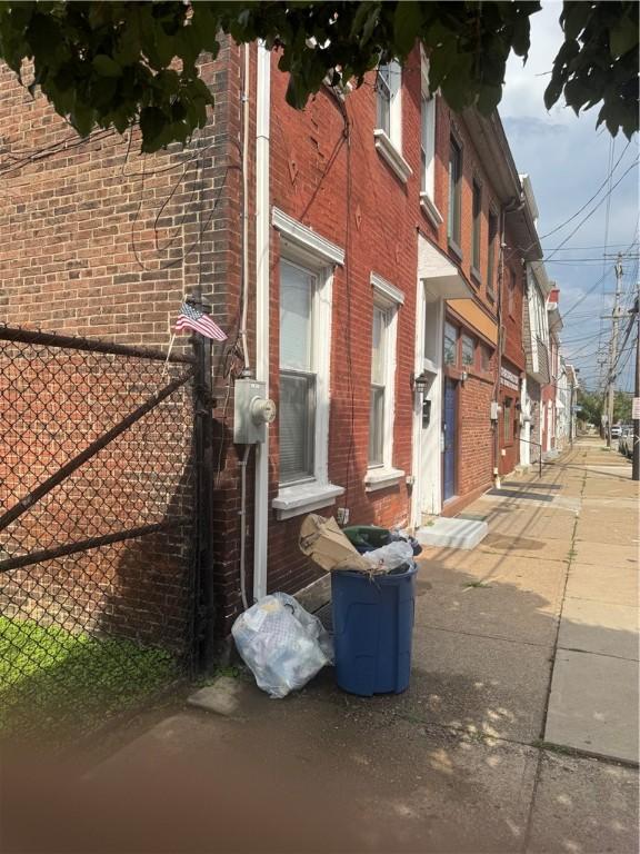 2411 Sarah St, South Side, PA 15203 - view of side of property featuring brick siding